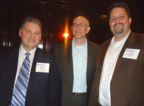 Mark Hein (SRA International), Bob Ragsdale (MicroPact) and Joe Pendry (GDIT)