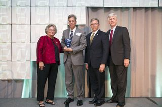 From left: NVTC President and CEO Bobbie Kilberg, Director, Leidos Community Relations and Corporate Responsibility Mike Coogan (accepting on behalf of Roger Krone), Northern Virginia Community College President Dr. Scott Ralls and Inova Center for Personalized Health CEO and NVTC Board Chair Todd Stottlemyer. Image credit: NVTC