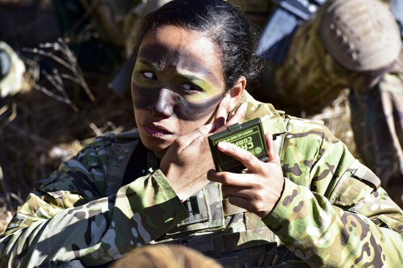 .S. Army Capt. Julissa Myers, Paratrooper assigned to the 173rd Brigade Support Battalion, 173rd Airborne Brigade, puts the finishing touches to her face paint camouflage in preparation a blank-fire exercise as part of Lipizzaner V at Pocek Range in Postonja, Slovenia, March 12, 2019. Lipizzaner is a combined squad-level training exercise in preparation for platoon evaluation, and to validate battalion-level deployment procedures. (U.S. Army photo by Paolo Bovo)